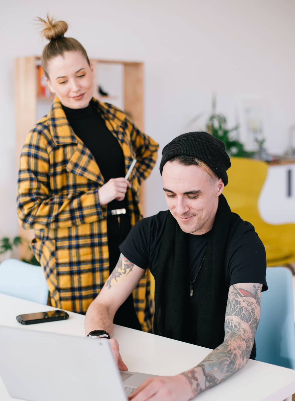 Image of team members working on their computers