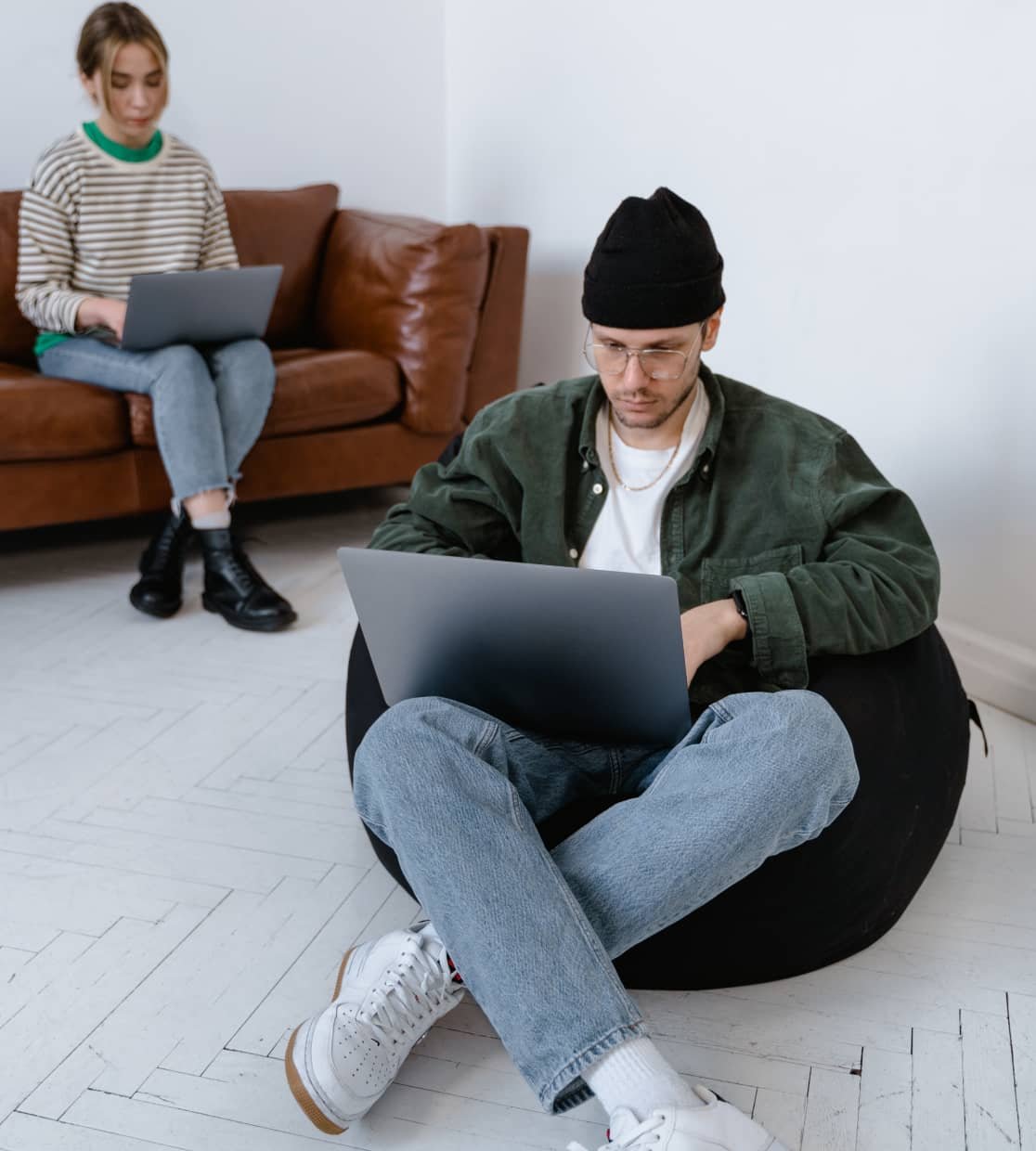 Image of team members working on their computers
